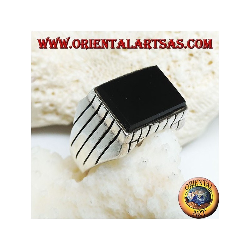 Silver ring with raised rectangular flat onyx and stripes on the sides