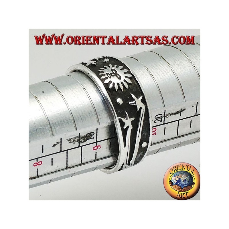 Bague en argent avec soleil et étoiles de comète en bas-relief