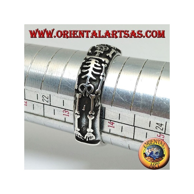 Silver record ring with integral high relief skeleton