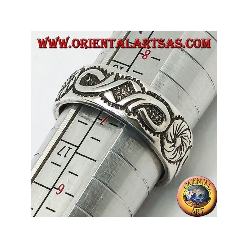 Ring in silver with continuous flower decoration and bas-relief bows