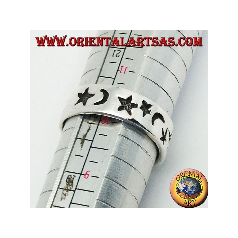 Smooth silver ring with thick engravings of stars and moons