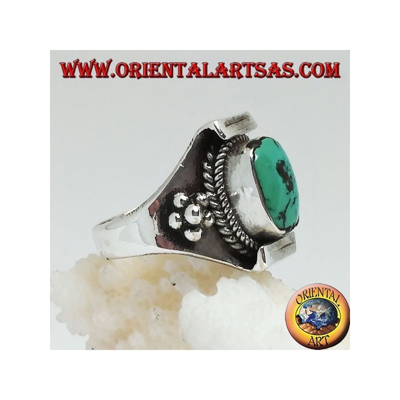 Silver ring with Tibetan antique turquoise on a Nepalese setting and balls on the sides