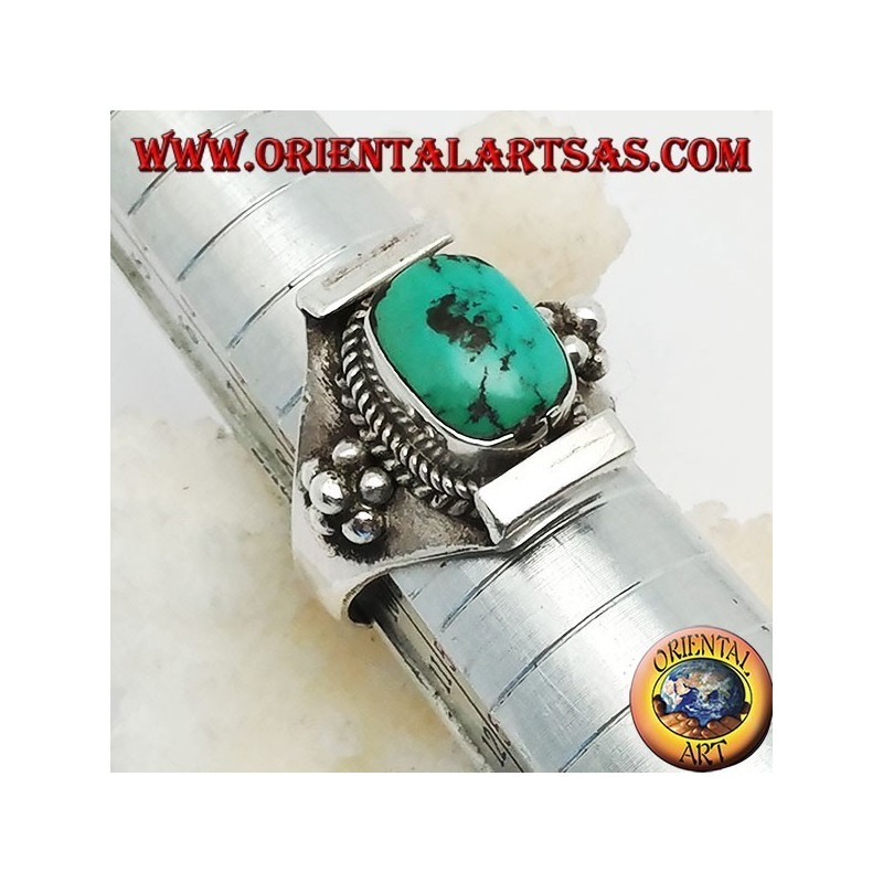 Silver ring with Tibetan antique turquoise on a Nepalese setting and balls on the sides