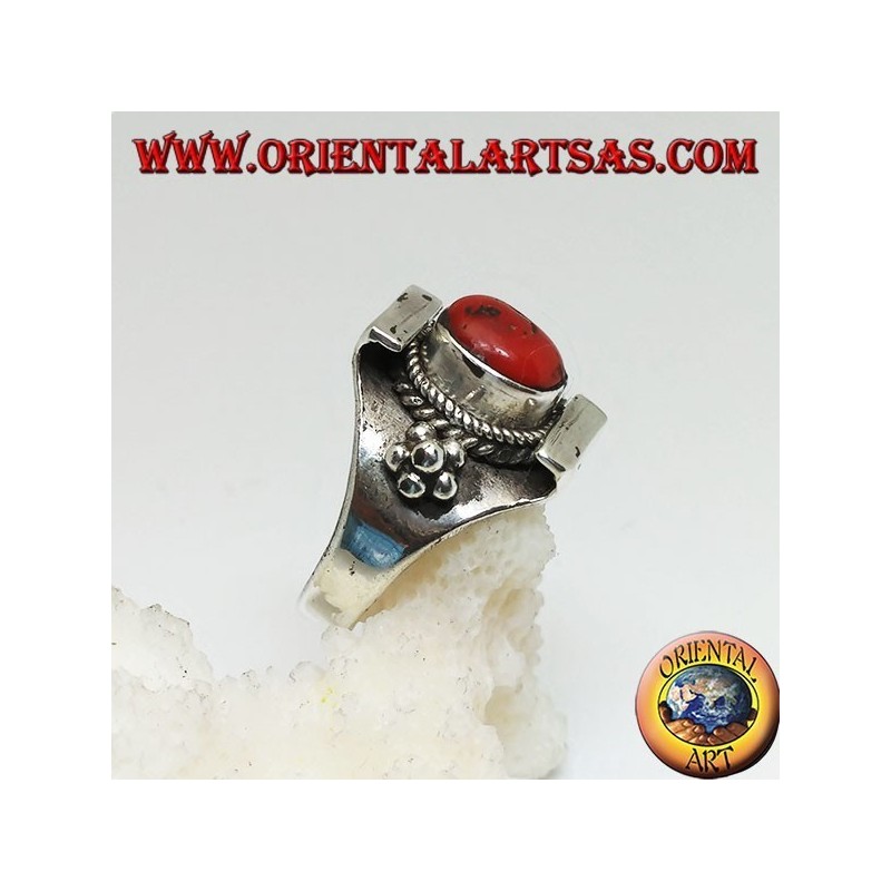 Silver ring with ancient Tibetan coral on a Nepalese setting and balls on the sides