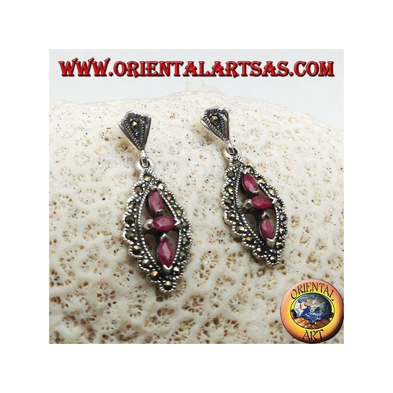 Silver earrings with three natural oval rubies in a marcasite rhombus
