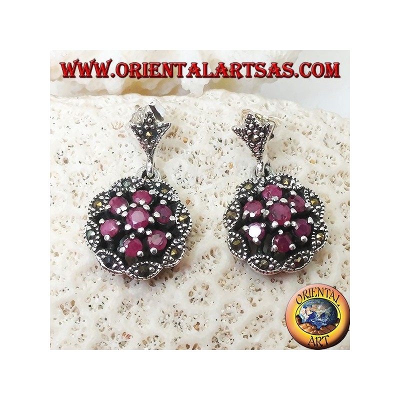Silver earrings with triple concentric circles of natural round rubies set and shuttle marcasite