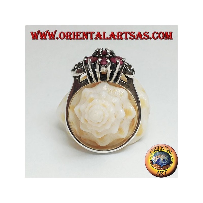 Silver ring with natural round ruby set with three rubies above and below and marcasite on the sides