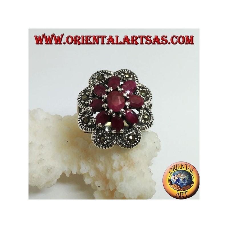 Silver ring with octagonal flower of natural oval rubies set and 8 semicircles of marcasite