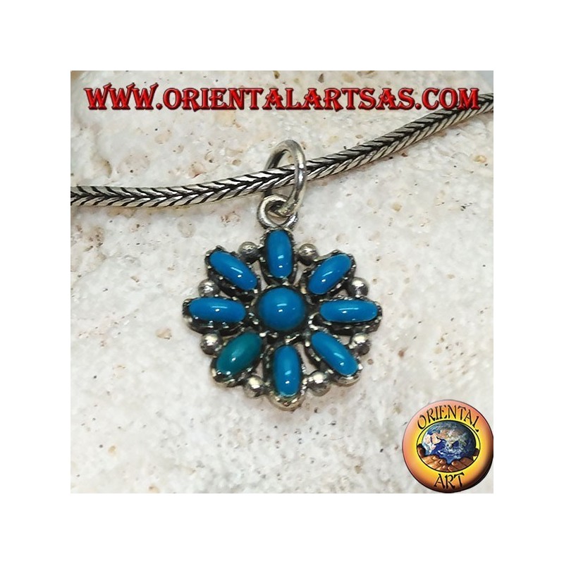Silver octagonal flower pendant with oval turquoise and a round one in the center