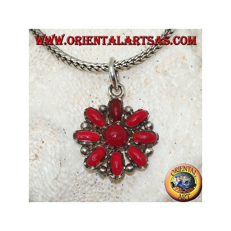 Silver pendant with an octagonal flower of oval corals and a round one in the center
