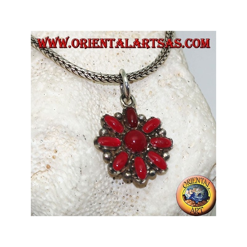 Silver pendant with an octagonal flower of oval corals and a round one in the center