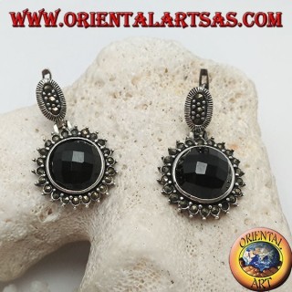 Silver earrings with faceted round onyx surrounded by marcasite and lever closure