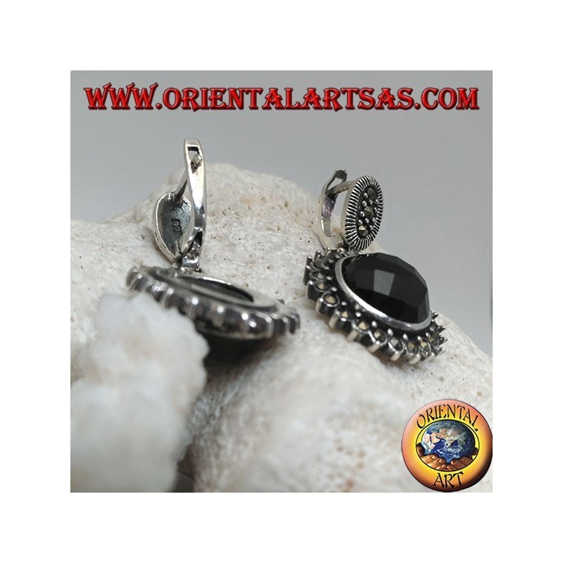 Silver earrings with faceted round onyx surrounded by marcasite and lever closure