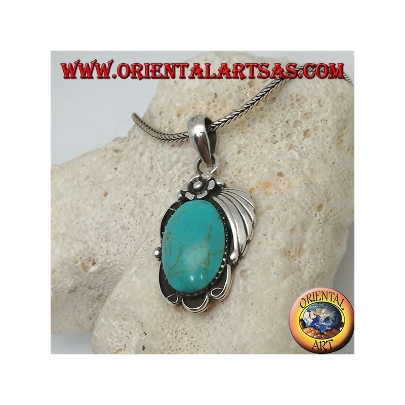Silver pendant with large oval turquoise on a frame with flower and ribbon