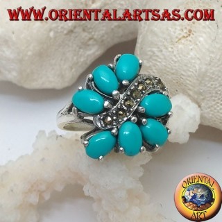 Bague en argent avec 7 turquoise ovale, divisée par une ligne de vague en marcassite