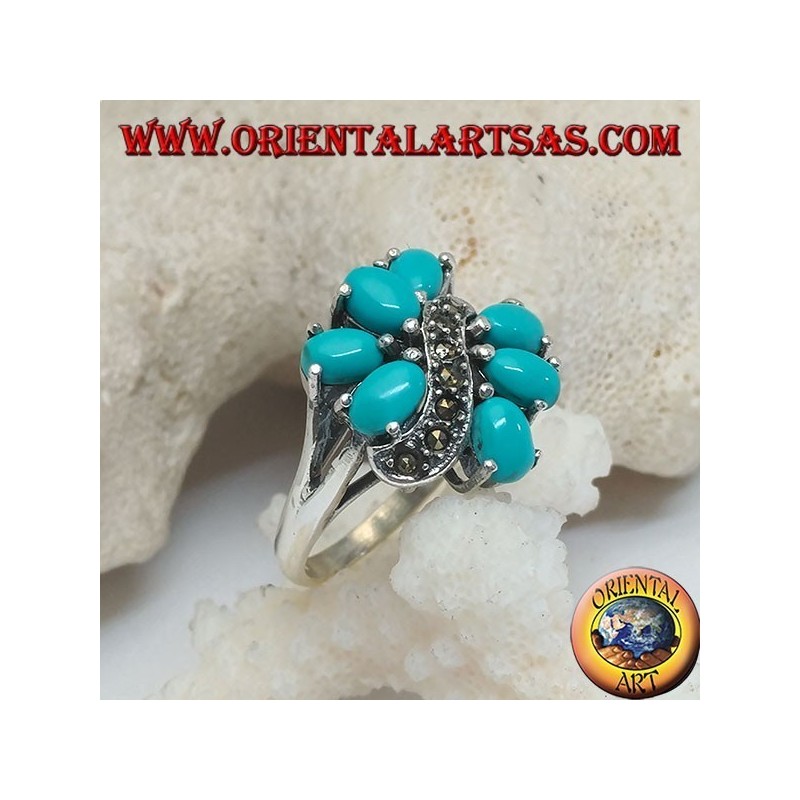 Silver ring with 7 oval turquoise set, divided by a marcasite wave line
