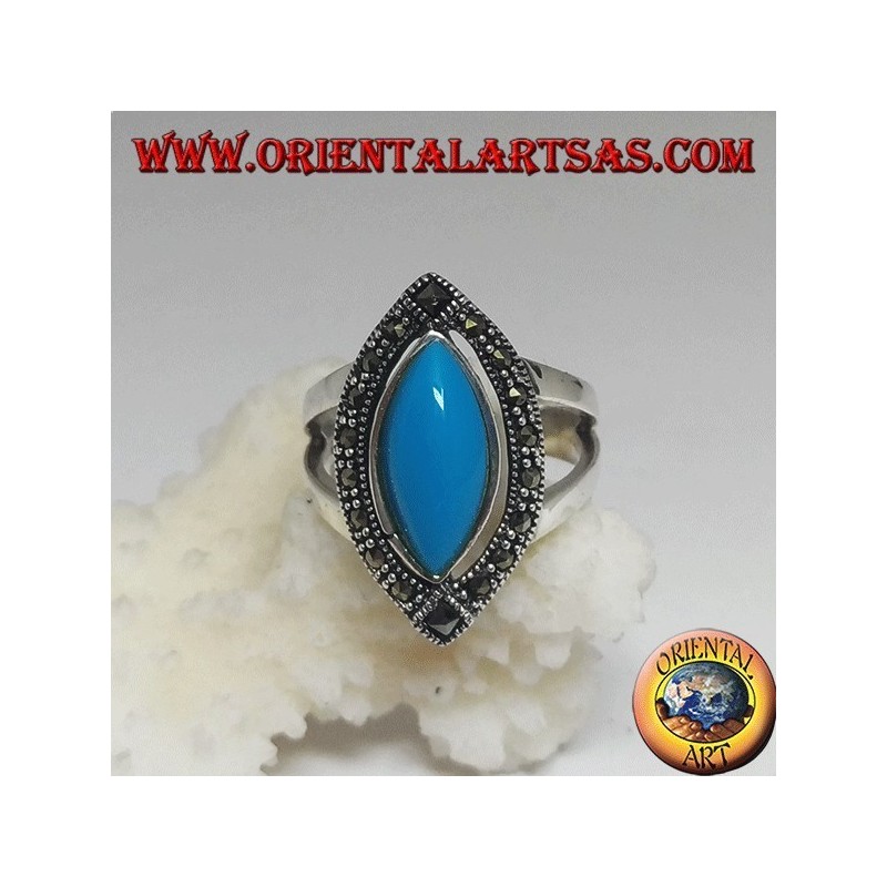 Silver ring, with turquoise cabochon cut shuttle surrounded by marcasite