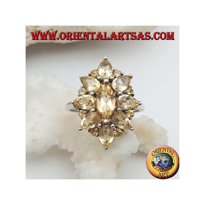 Anillo de flores ovaladas de plata formado por topacios de lanzadera de citrino incrustado