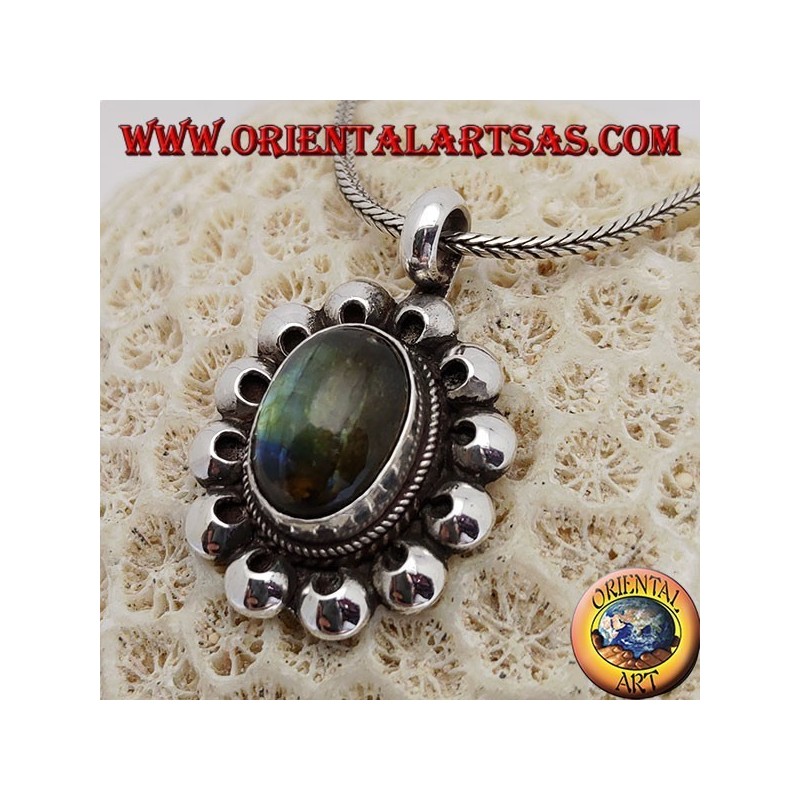 Silver pendant with oval fluorescent labradorite surrounded by perforated discs