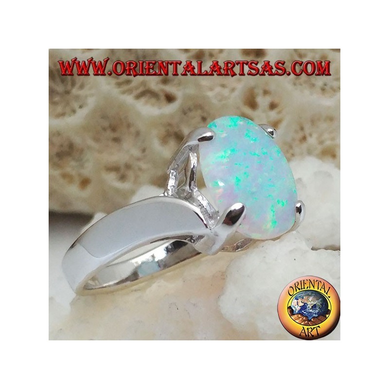 Silver ring with oval white opal set and curved frame on the sides