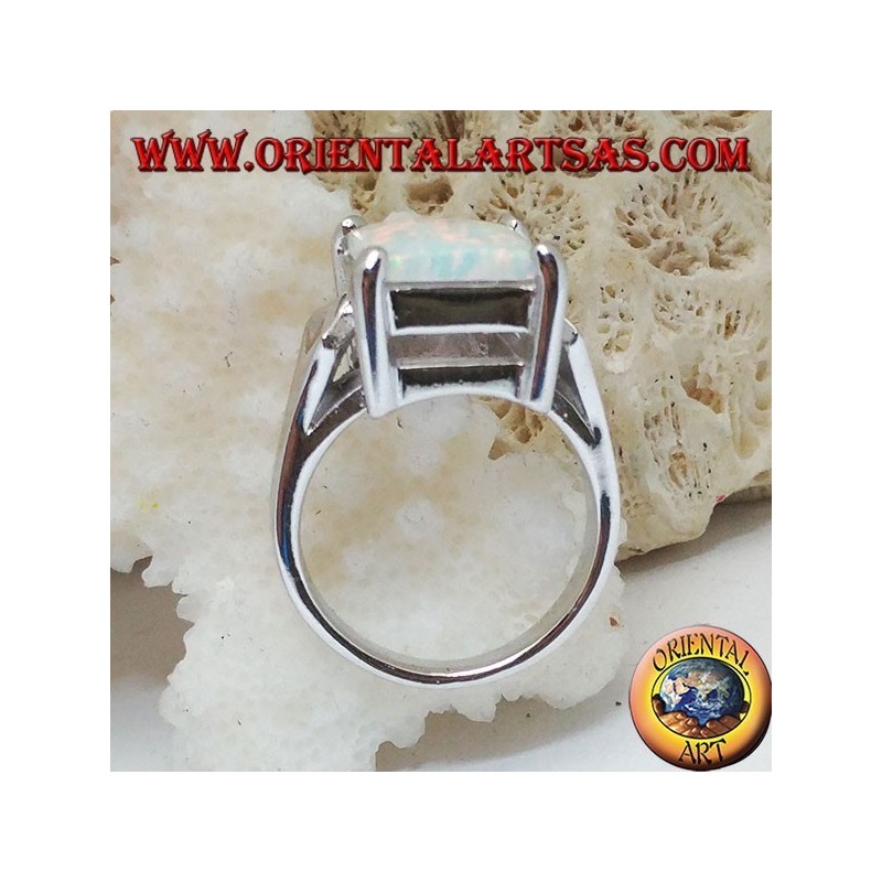 Silver ring with rectangular white opal set and V-shaped frame on the sides