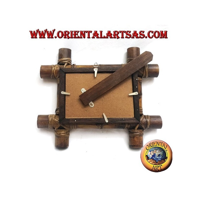 Marco de fotos en madera de teca y con inserción de cuatro cañas de bambú de 28x23 cm.