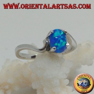 Silver ring with oval blue opal set and asymmetrical setting