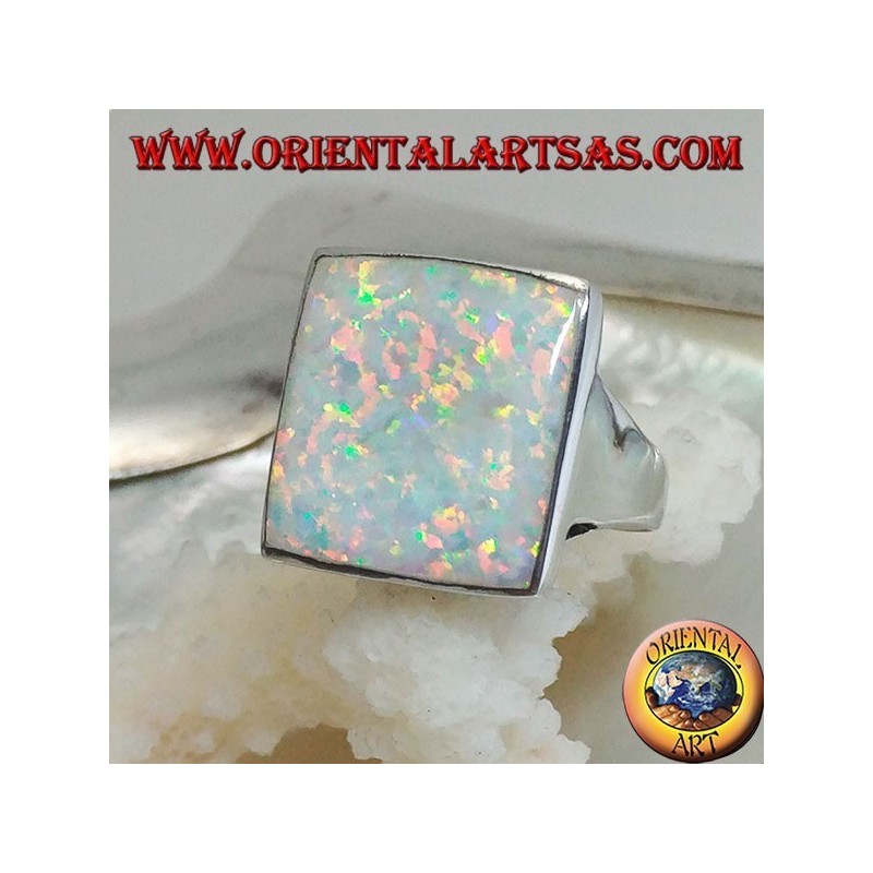 Silver ring with large square harlequin opal with openwork on the corners