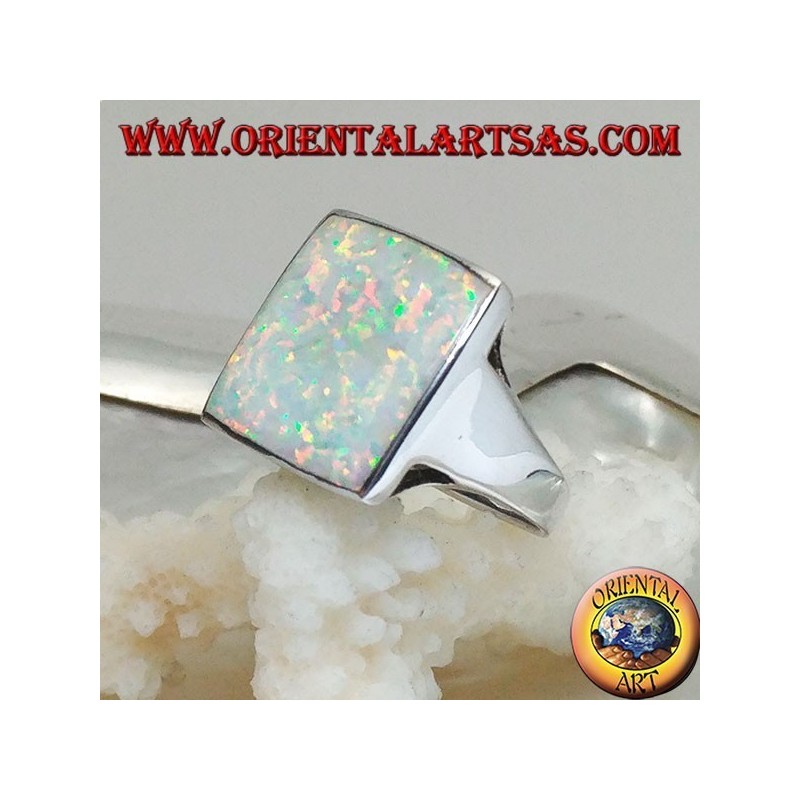 Silver ring with large square harlequin opal with openwork on the corners