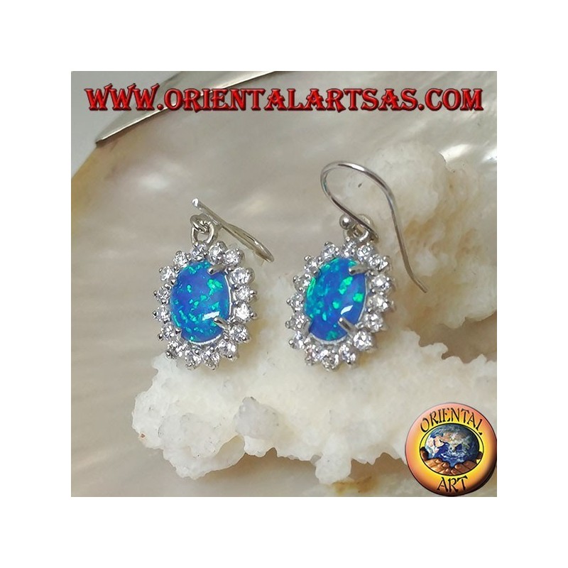 Silberohrringe mit ovalem blauem Feueropal, umgeben von Zirkonia (groß)