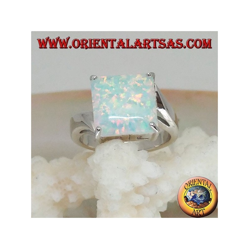 Silver ring with square harlequin opal set in four and asymmetrical setting