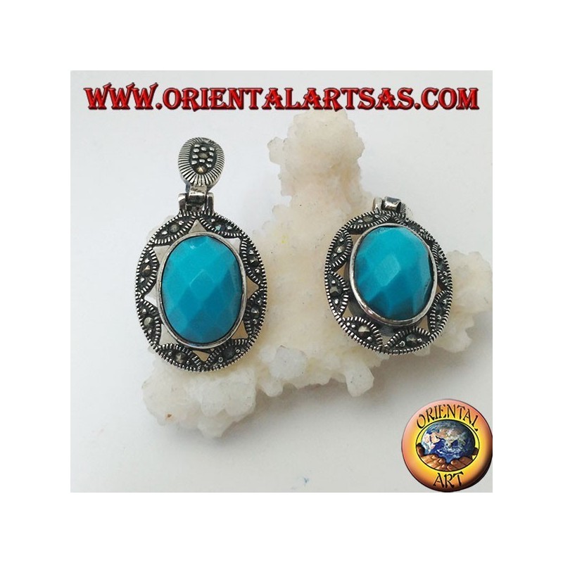 Orecchini in argento con turchese ovale sfaccettato cabochon contornato da traforo a stella e marcassite