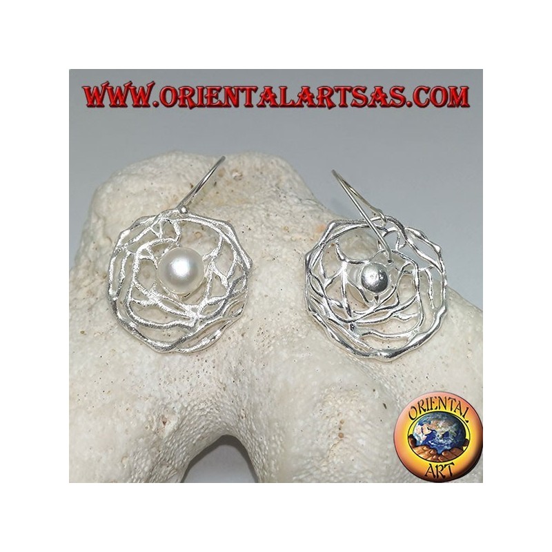 Dangling silver earrings with white freshwater pearl in a round satin weave of threads