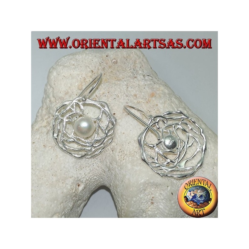 Dangling silver earrings with white freshwater pearl in a round satin weave of threads