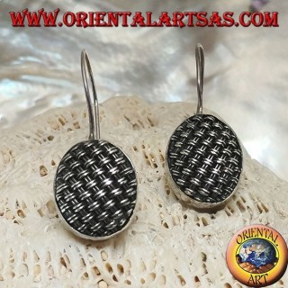 Dangling silver earrings with tightly woven oval