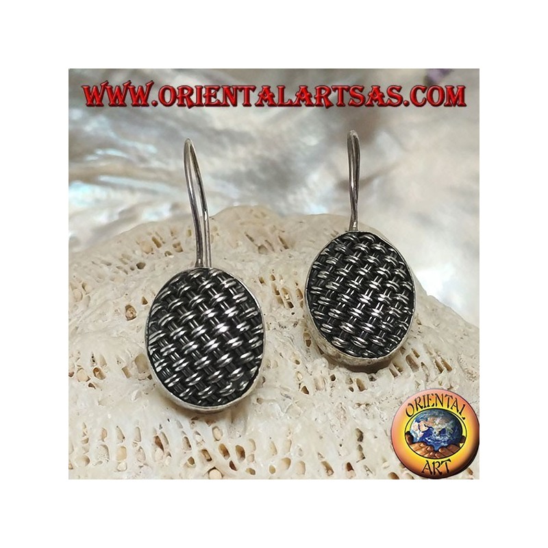 Dangling silver earrings with tightly woven oval