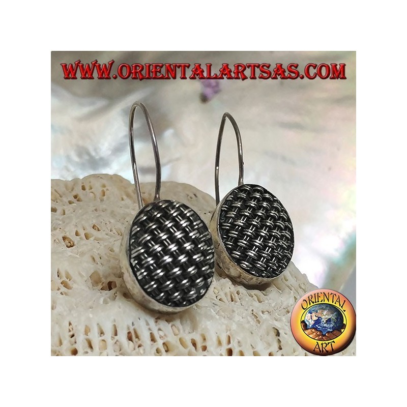 Dangling silver earrings with tightly woven oval