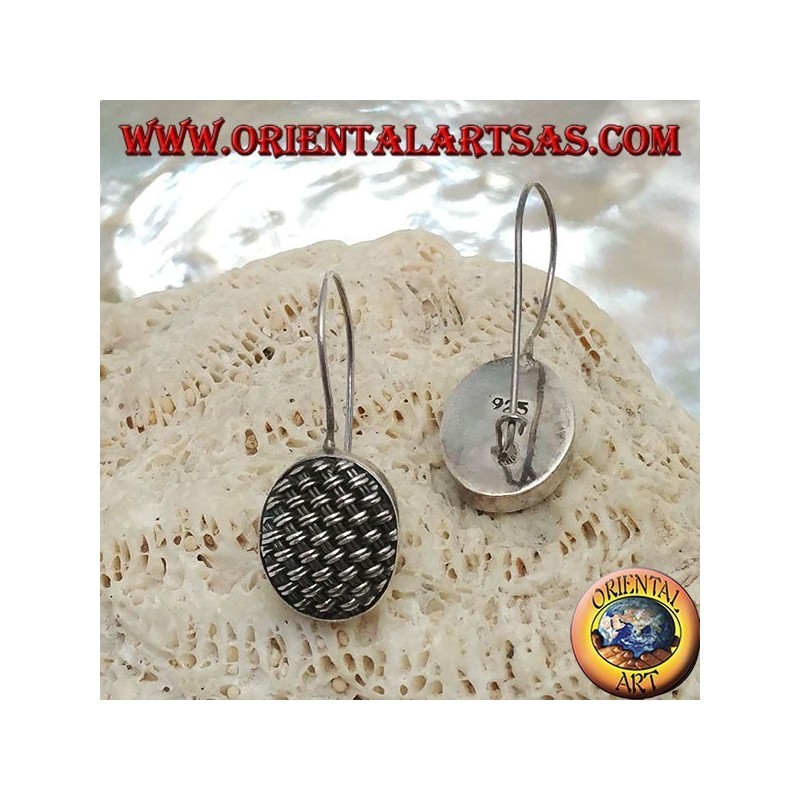 Dangling silver earrings with tightly woven oval