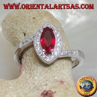 Silver ring with shuttle garnet set surrounded by zircons and asymmetrical setting