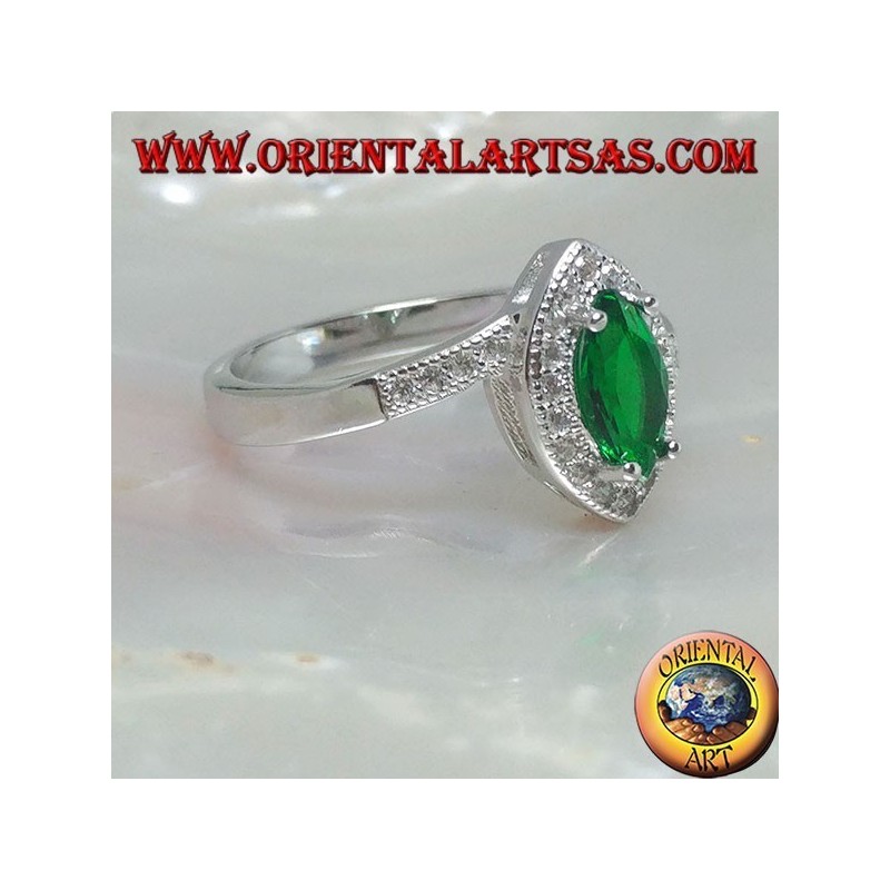 Silver ring with synthetic shuttle emerald set surrounded by zircons on an asymmetrical setting