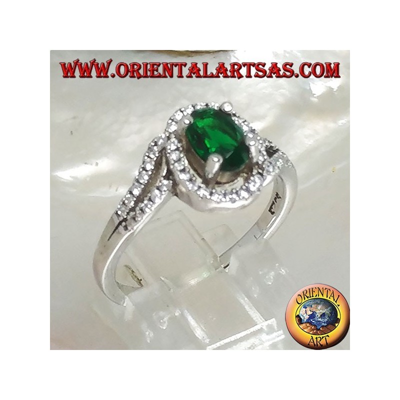 Anello in argento con smeraldo sintetico e zirconi su montatura concentrica