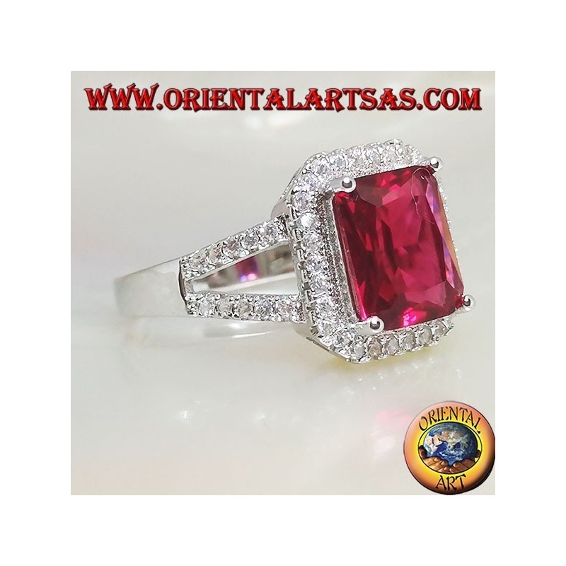 Silver ring with rectangular natural ruby set surrounded by zircons and two lateral lines