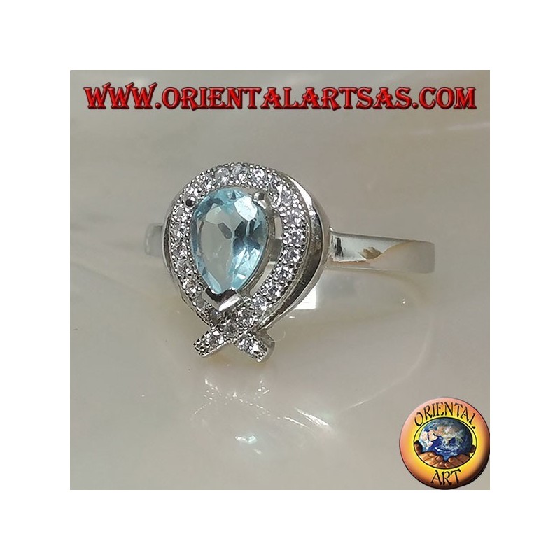 Anello in argento con topazio azzurro naturale a goccia contornato da zirconi (intersezione su punta)