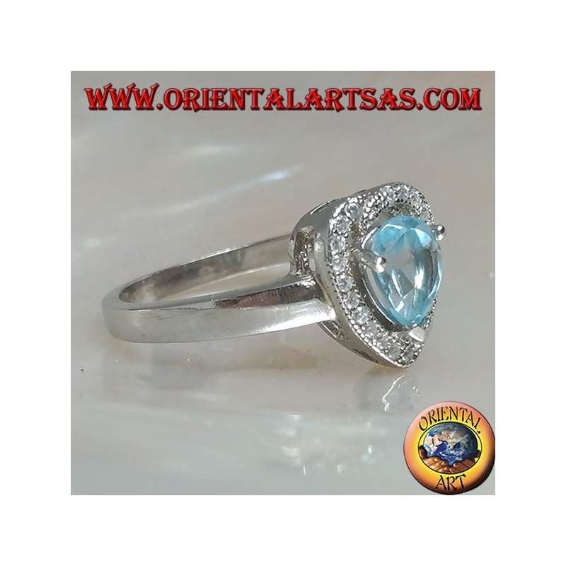 Anello in argento con topazio azzurro naturale a goccia incastonato contornato da zirconi 