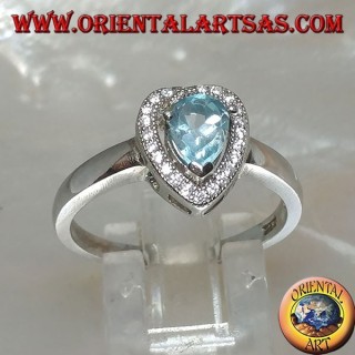 Silver ring with natural blue drop topaz set surrounded by zircons