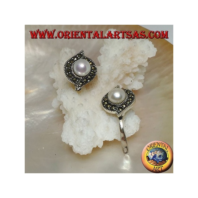 Lever-lock silver earrings with freshwater pearl surrounded by a line of marcasite