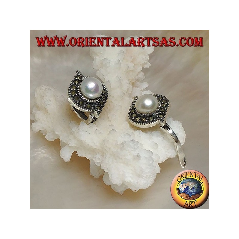 Lever-lock silver earrings with freshwater pearl surrounded by a line of marcasite