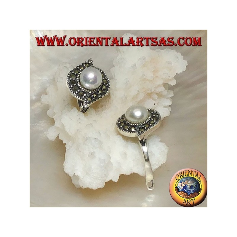 Lever-lock silver earrings with freshwater pearl surrounded by a line of marcasite