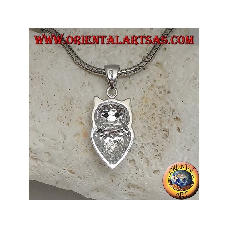 Silver pendant in the shape of an owl studded with white zircons and black zircon eyes