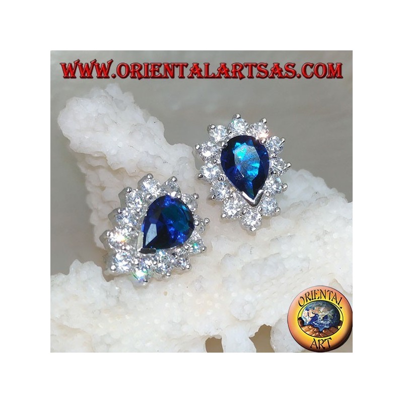 Silver lobe earrings with synthetic teardrop sapphire surrounded by zircons
